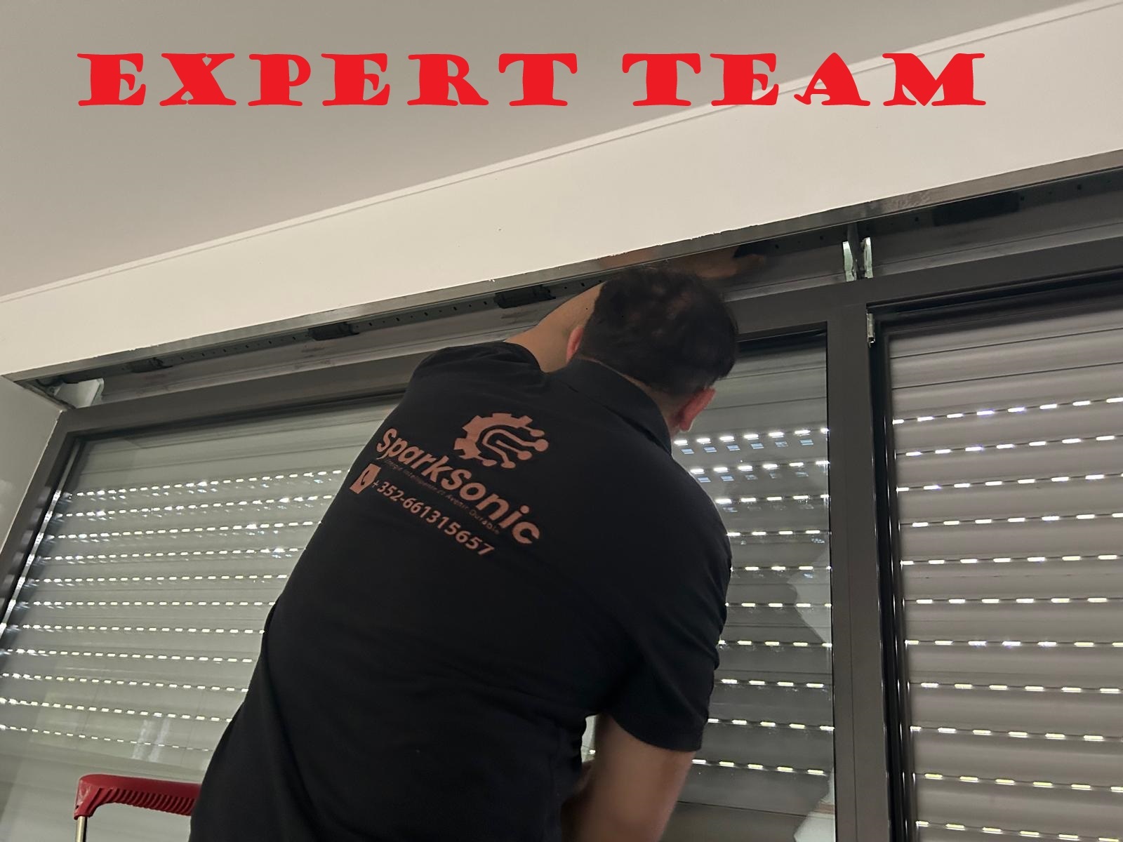 Sparksonic technician performing electric shutter repair in Luxembourg apartment