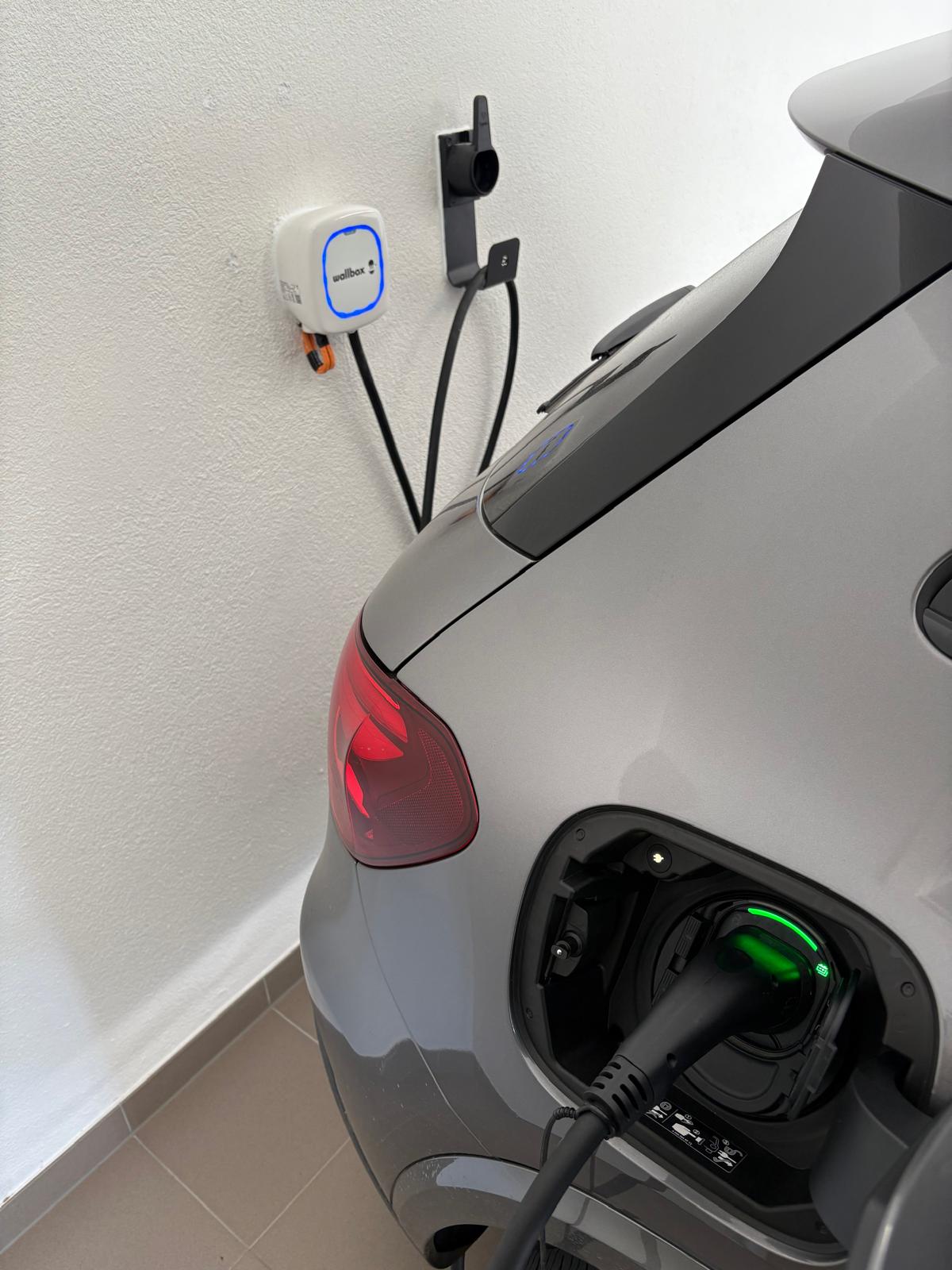 Mercedes EQB 250+ connected to a Wallbox Pulsar Plus charger, installed by SparkSonic in a residential garage.